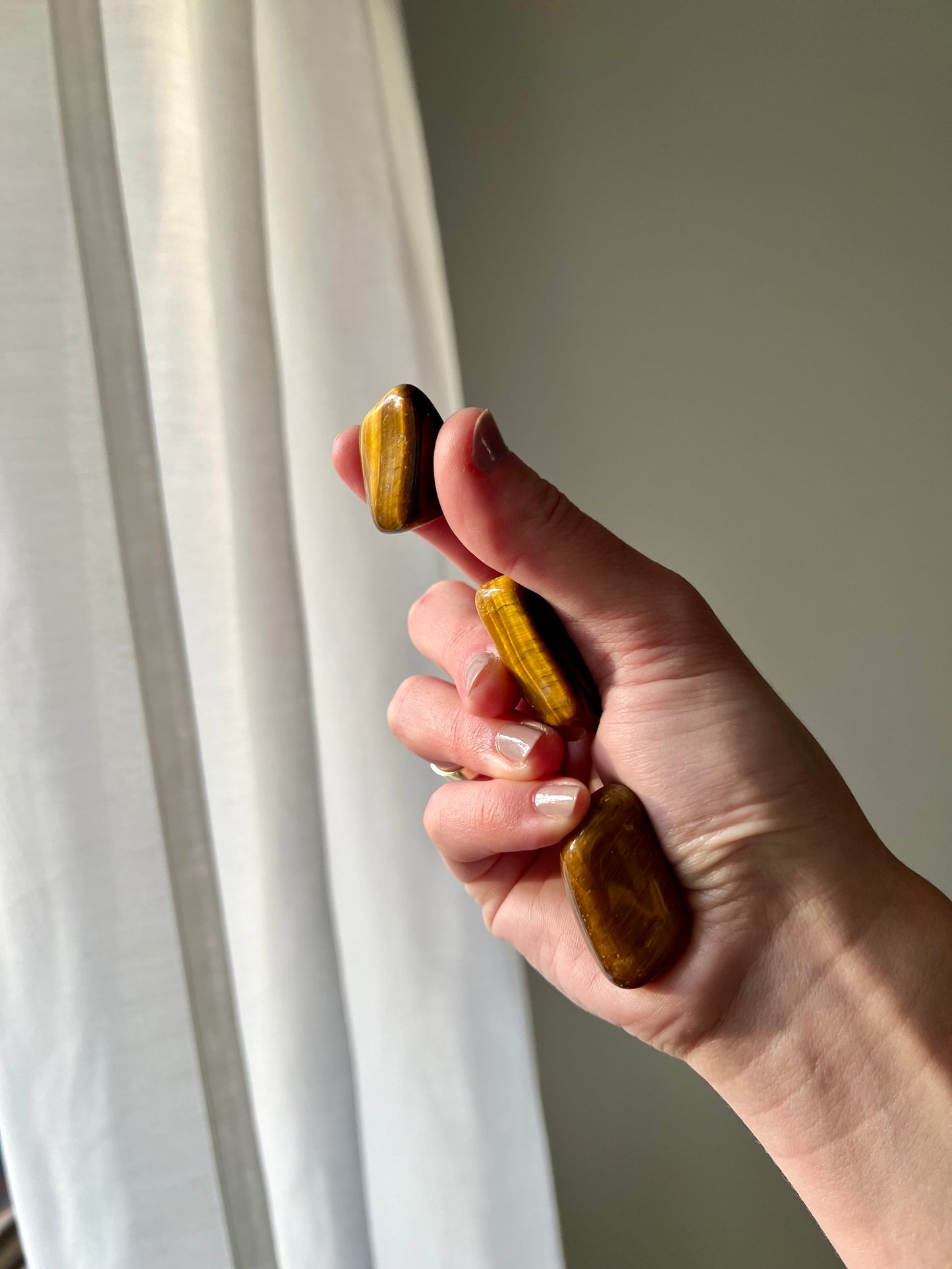 Tigers Eye tumbled stone from South Africa