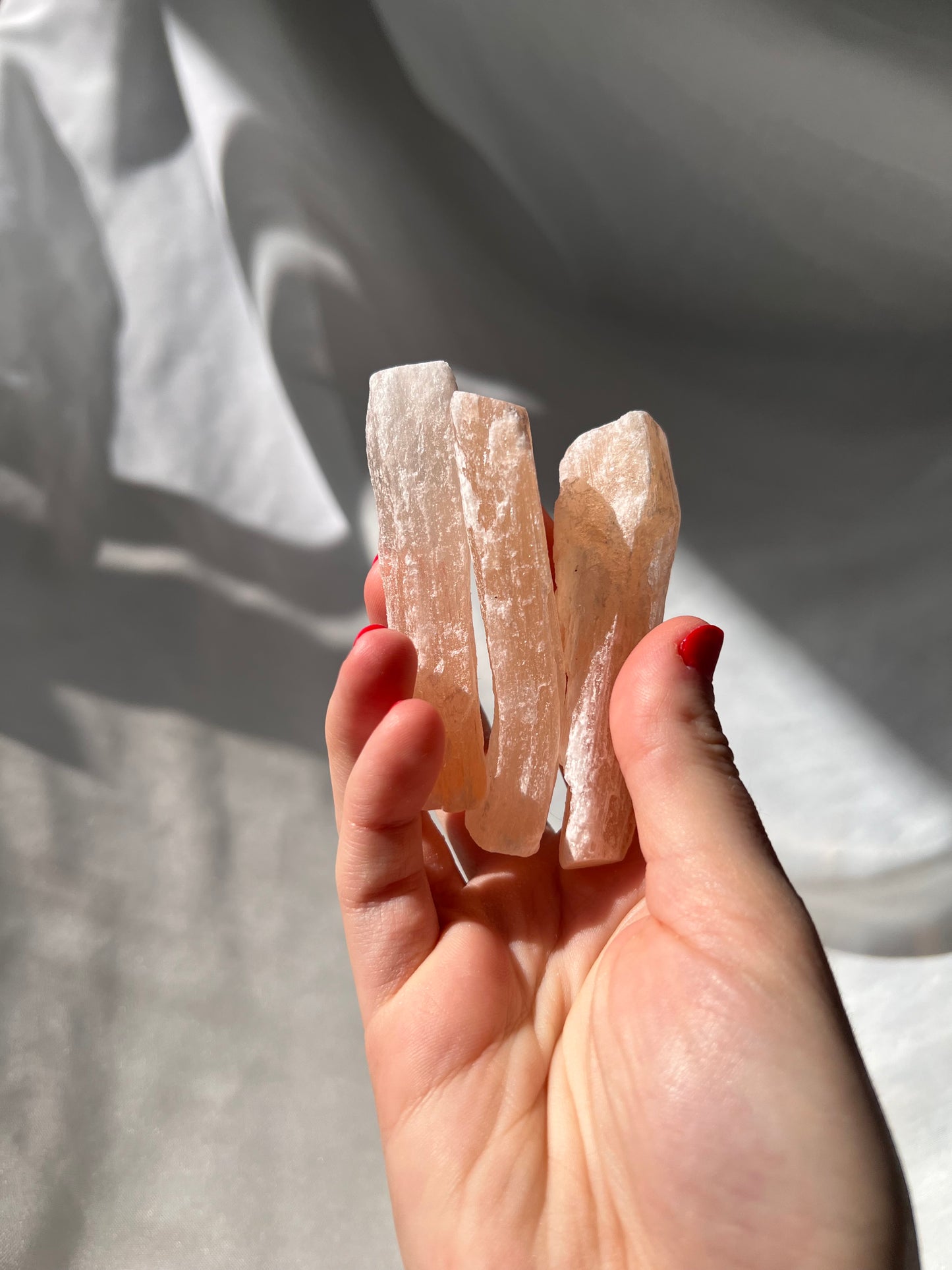 Peach Selenite rod from Morocco
