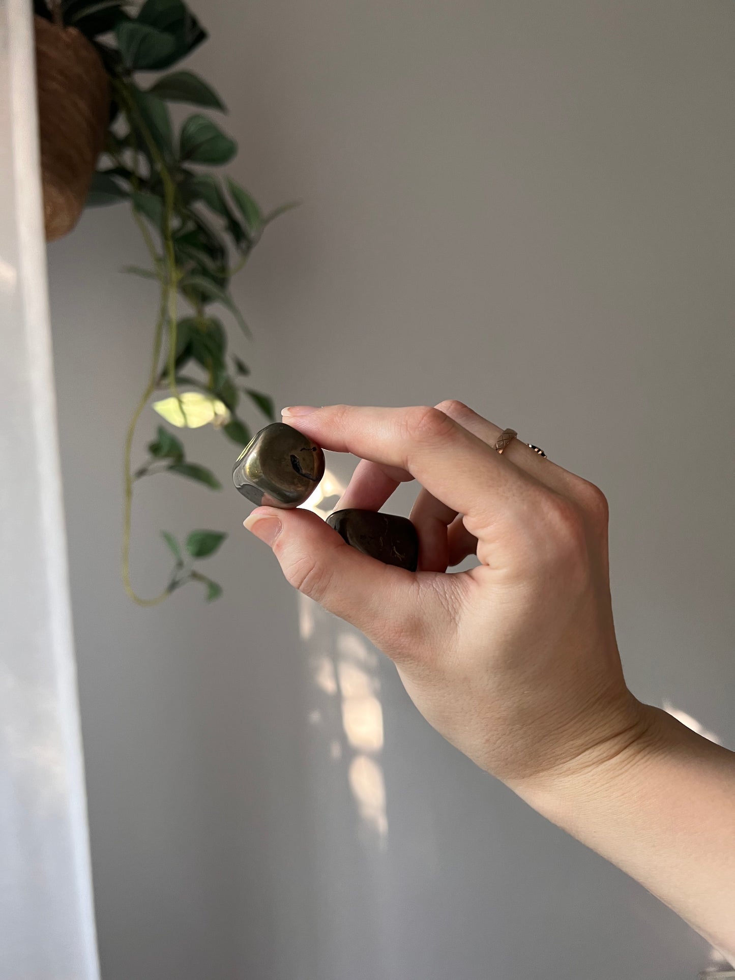 Pyrite tumbled stone from Peru