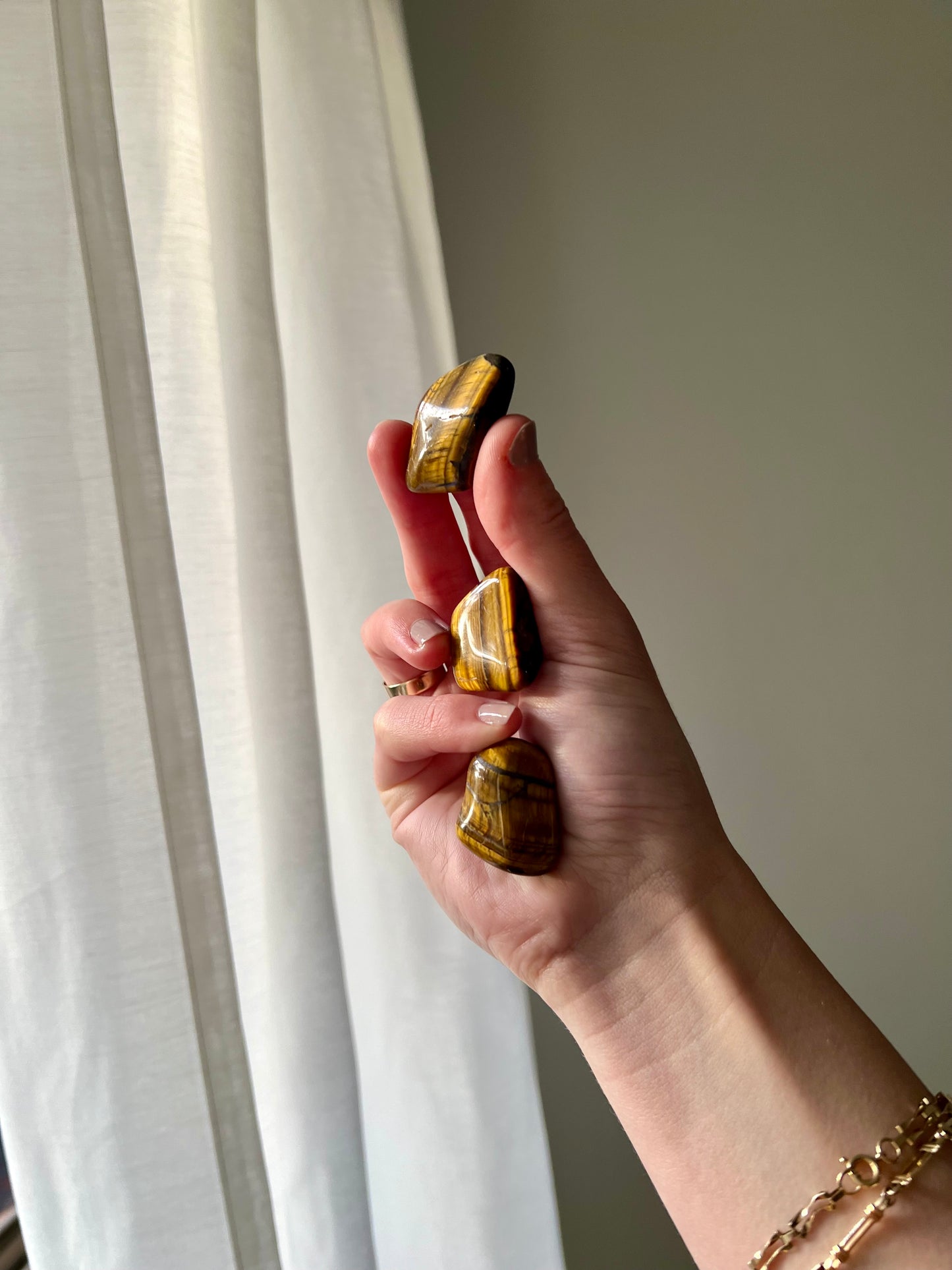Tigers Eye tumbled stone from South Africa