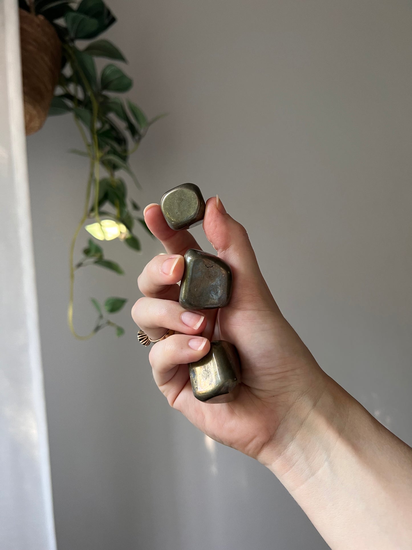 Pyrite tumbled stone from Peru