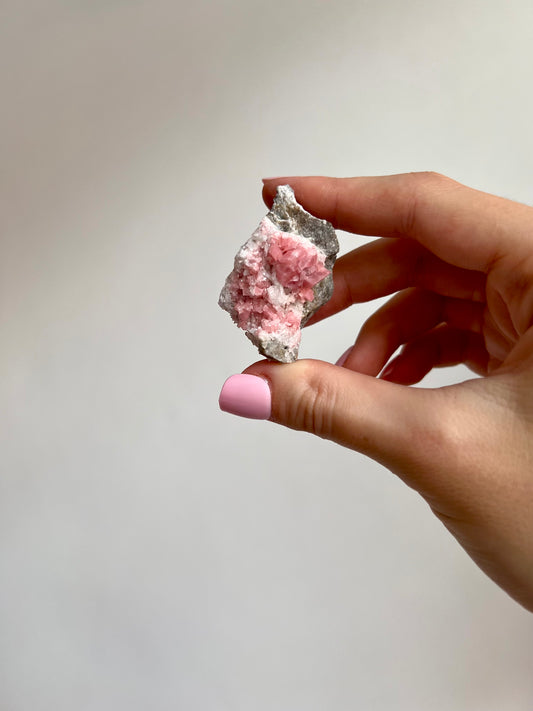 Rhodochrosite on Quartz from Peru