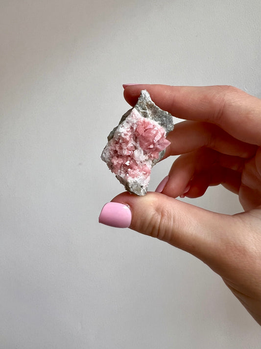 Rhodochrosite on Quartz from Peru