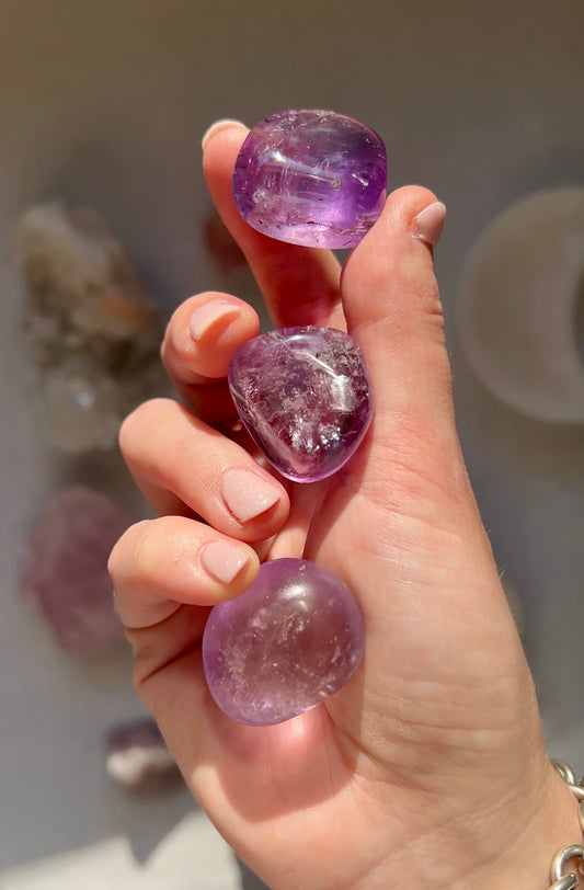 A grade Amethyst tumbled stone from Brazil